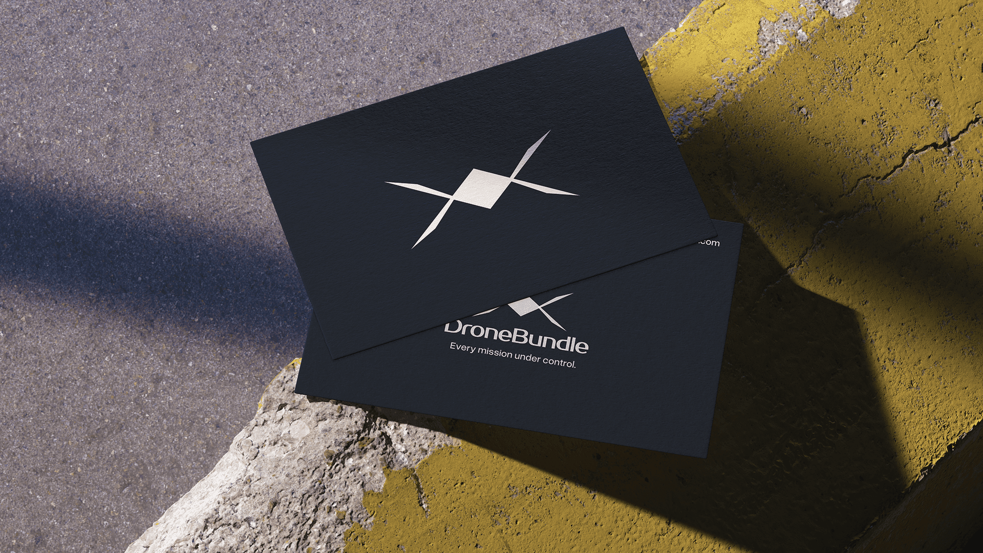 DroneBundle logo on a business card mockup